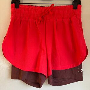 NWOT GymShark Running 2 In 1 Shorts. Color: Fluo Bold Pink/Magenta Brown. Size S
